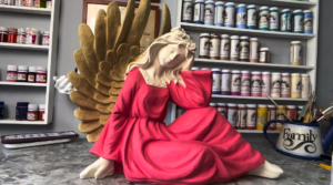 ANGEL SENTADO